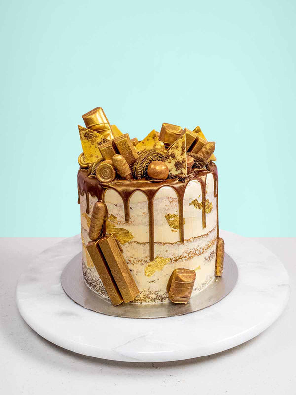 Gold bar cake  Golden birthday cakes, Creative birthday cakes